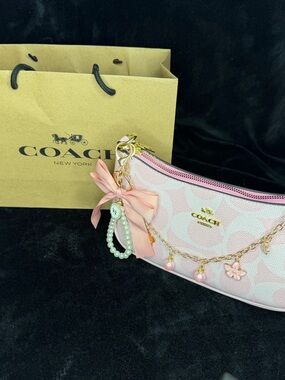 Coach Pink Logo Crescent Wristlet with Gold Charm Chain